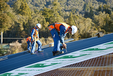 Warmer in winter, cooler in summer, dry all year.